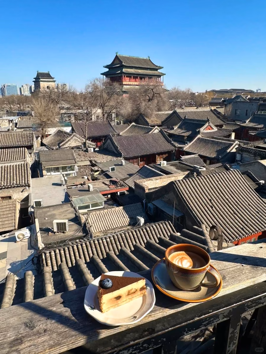 Coffee on a rooftop terrace with the Drum Tower in view